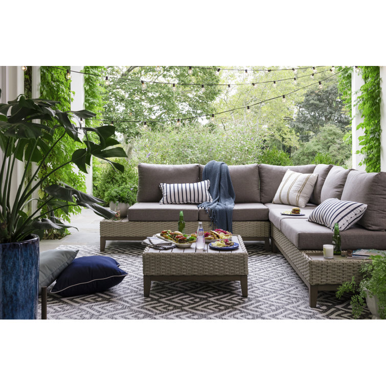 Fleur 4 Piece Rattan Sectional Seating Group with Cushions